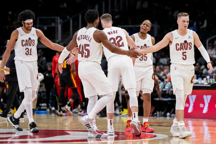 Jan 20, 2024; Atlanta, Georgia, USA; Cleveland Cavaliers players react during a timeout against the Atlanta Hawks during the second half at State Farm Arena.